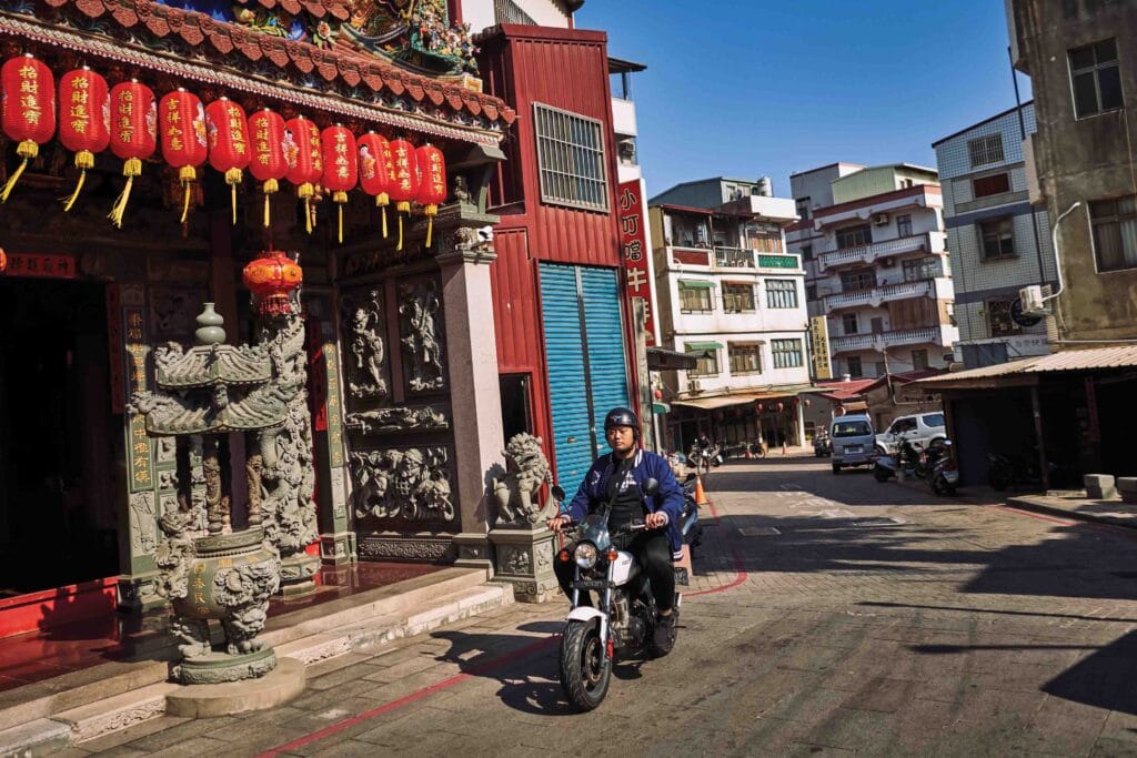  A man rides along a street in Kinmen, Taiwan