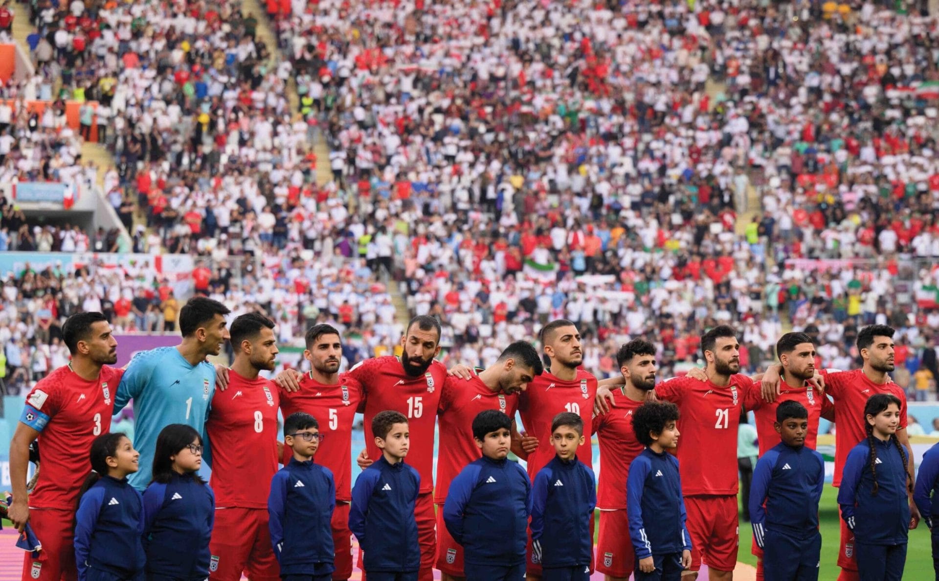 Iranian players line up for the national anthem ahead of the match against England at the Khalifa International Stadium on 21st November 2022