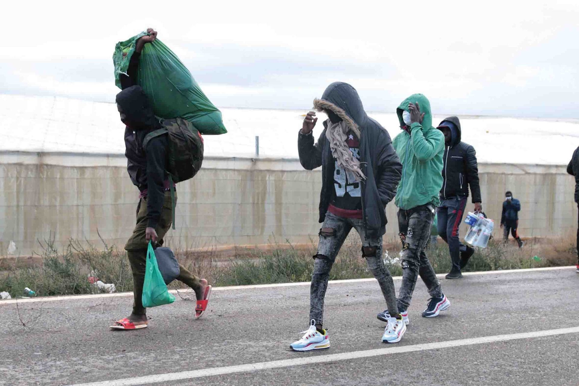  Shanty dwellers leave the El Walili camp in Nijar, Almería on 30th January 2023. The settlement caught on fire as its residents were being evicted