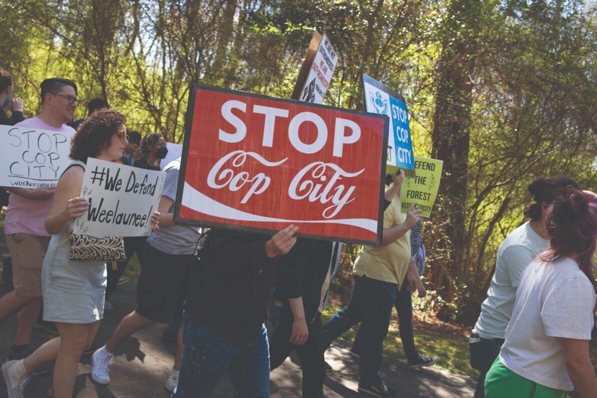 Protesters march through the South River Forest in Atlanta, a section of which is scheduled to be developed as a police training centre dubbed ‘Cop City’, 4th March 2023