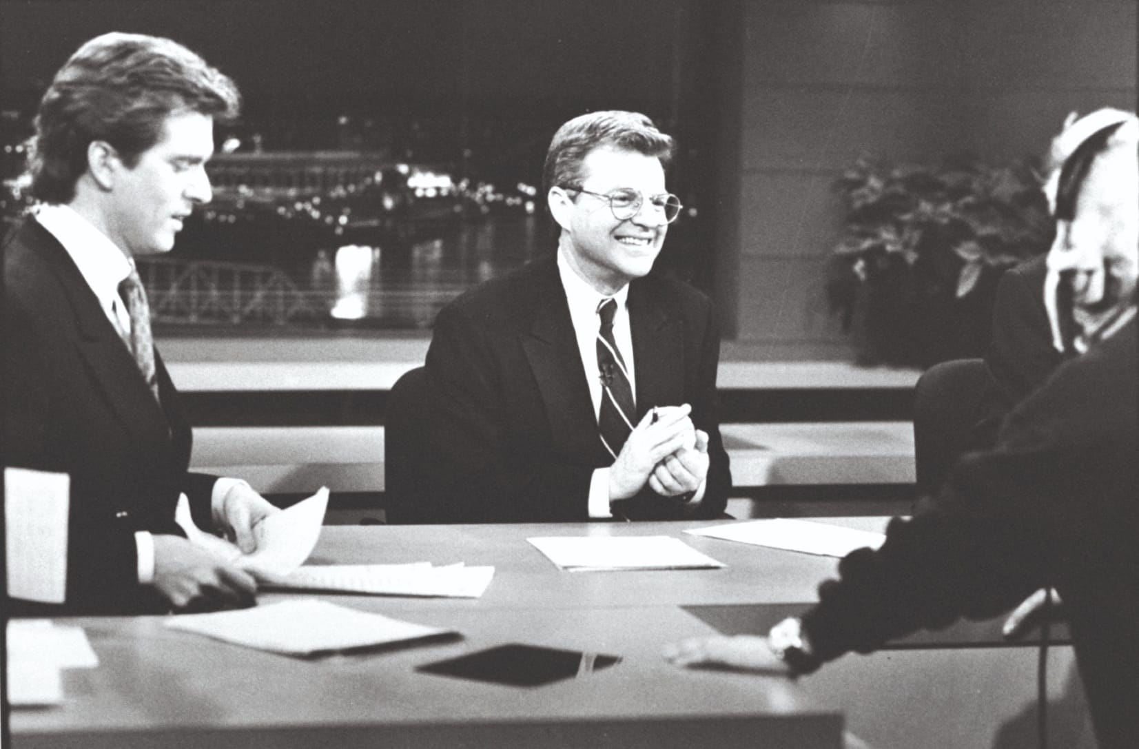 Jerry Springer chatting with co-anchor Jim Watkins and a technician before a news broadcast at WLWT-TV, 15th December 1992